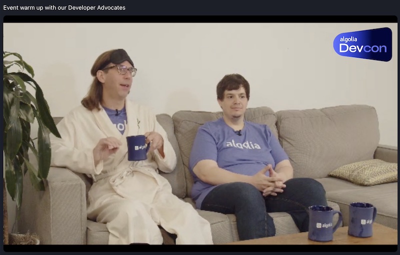 Algolia Developer Advocates Chuck and Michael on a couch at DevCon 2022